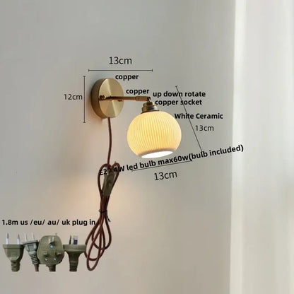 Antique brass and amber glass adjustable wall light bedroom sconce
