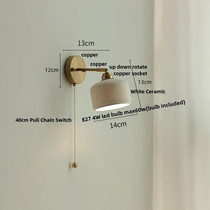 Antique brass and amber glass adjustable wall light bedroom sconce
