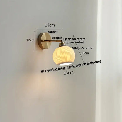 Antique brass and amber glass adjustable wall light bedroom sconce