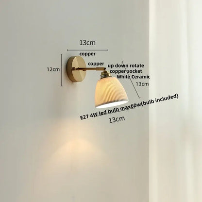 Antique brass and amber glass adjustable wall light bedroom sconce