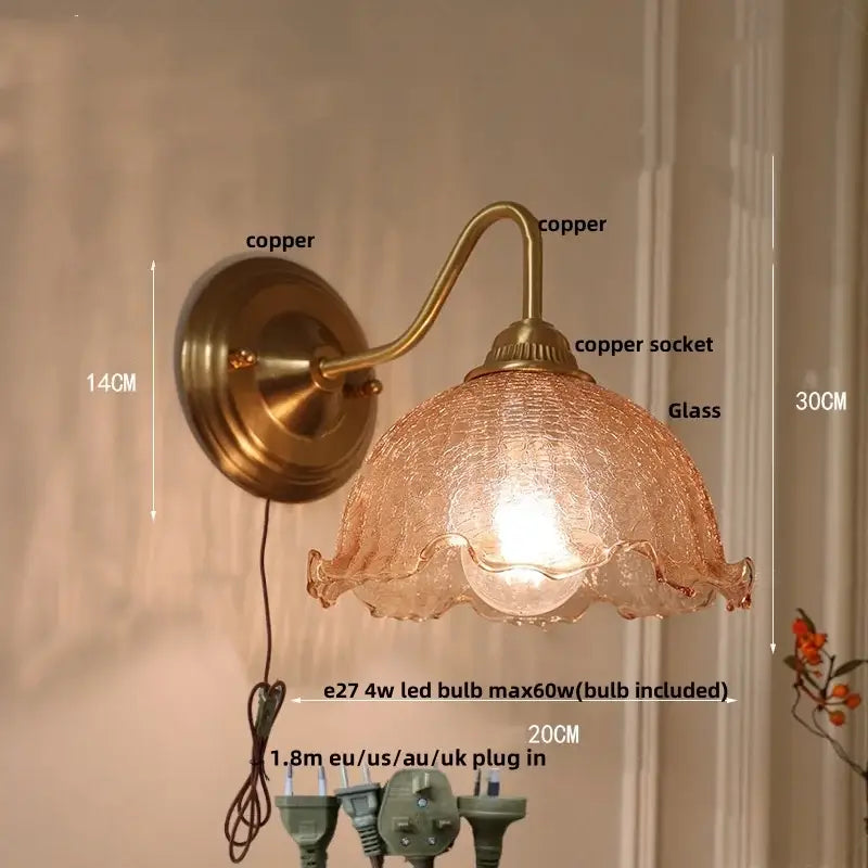 Antique brass and clear glass wall sconce bedroom light