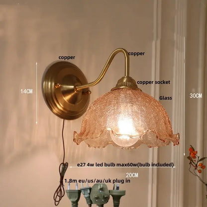 Antique brass and clear glass wall sconce bedroom light