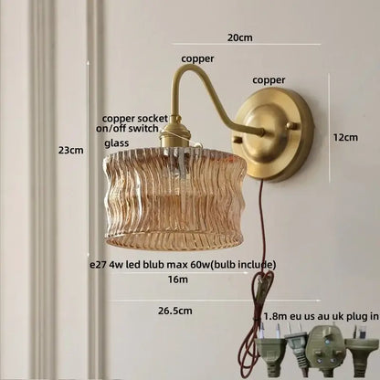 Antique brass and clear glass wall sconce bedroom light
