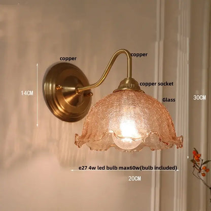 Antique brass and clear glass wall sconce bedroom light