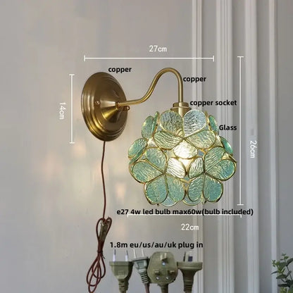 Antique brass and clear glass wall sconce bedroom light
