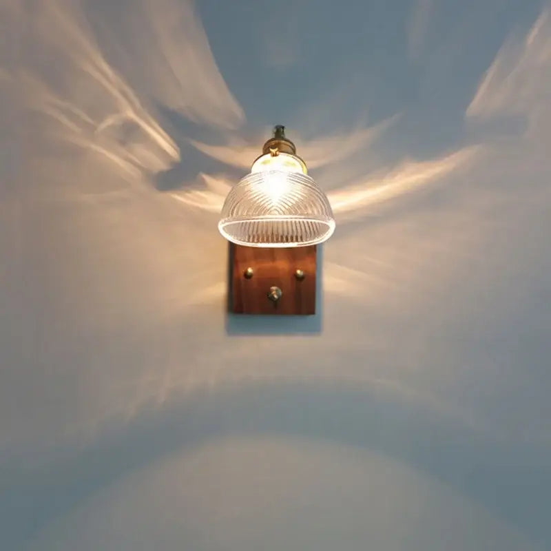 Antique brass and walnut clear glass wall lights stair fixture