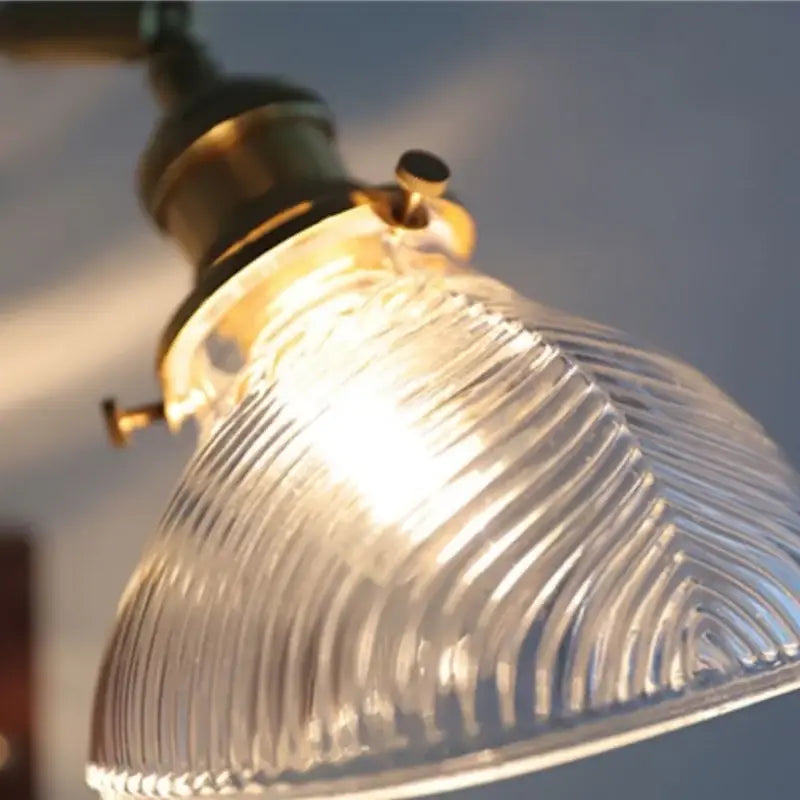 Antique brass and walnut clear glass wall lights stair fixture