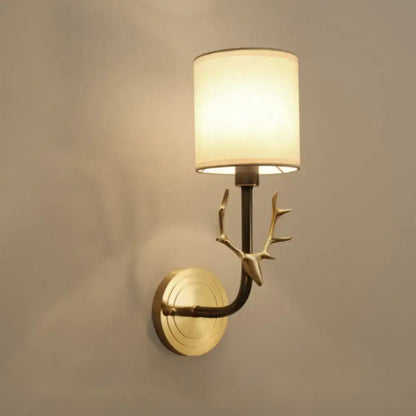 Antique brass antler wall sconce with fabric shade – bedroom light