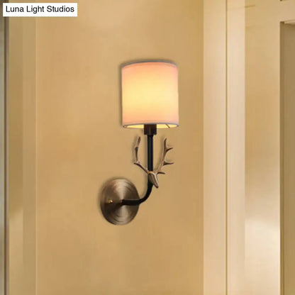 Antique brass antler wall sconce with fabric shade – bedroom light