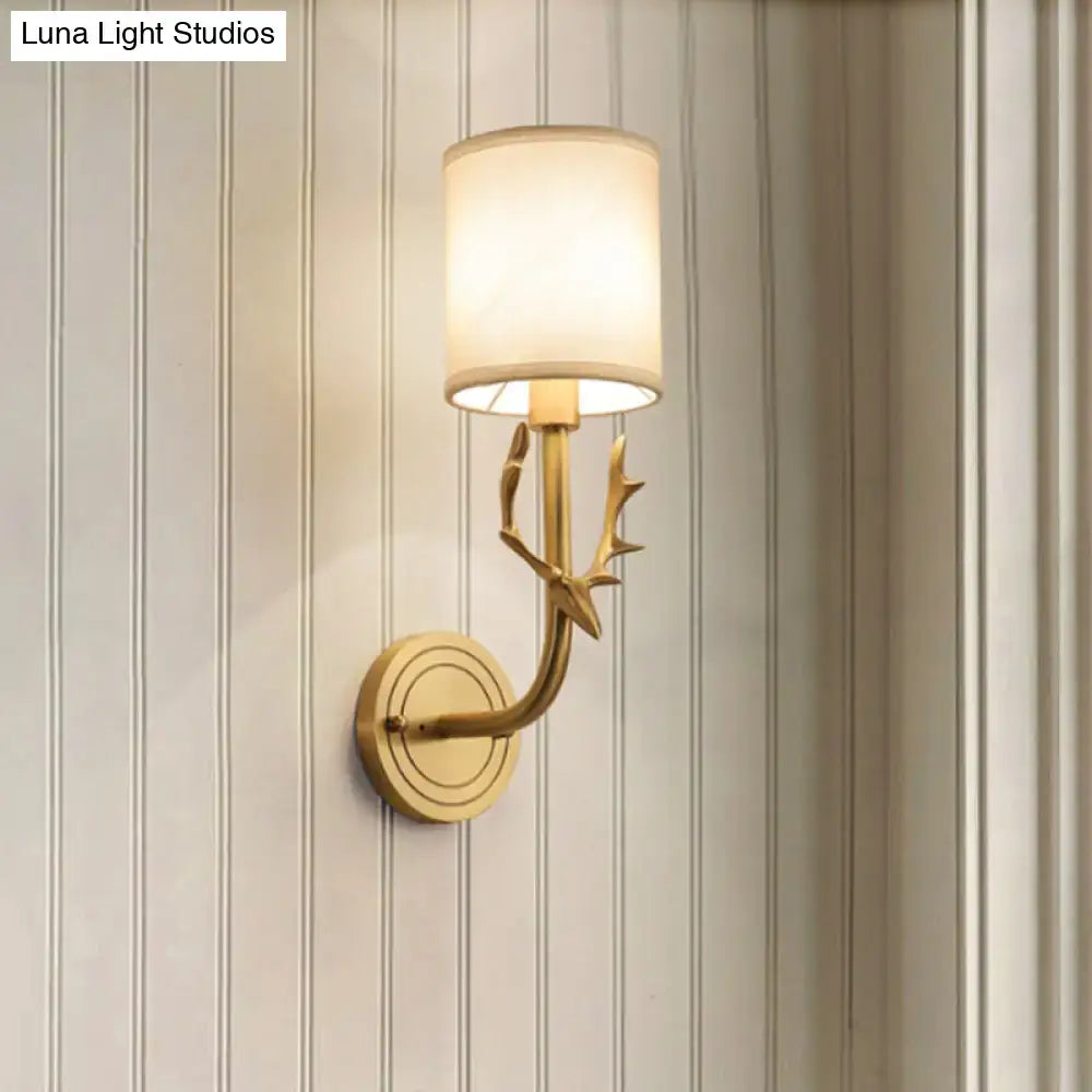 Antique brass antler wall sconce with fabric shade – bedroom light