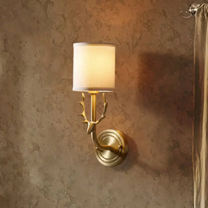 Antique brass antler wall sconce with fabric shade – bedroom light