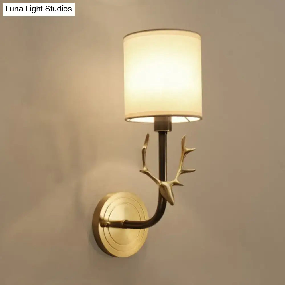 Antique brass antler wall sconce with fabric shade – bedroom light