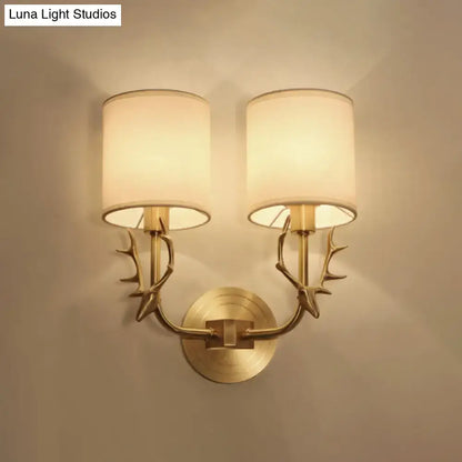 Antique brass antler wall sconce with fabric shade – bedroom light