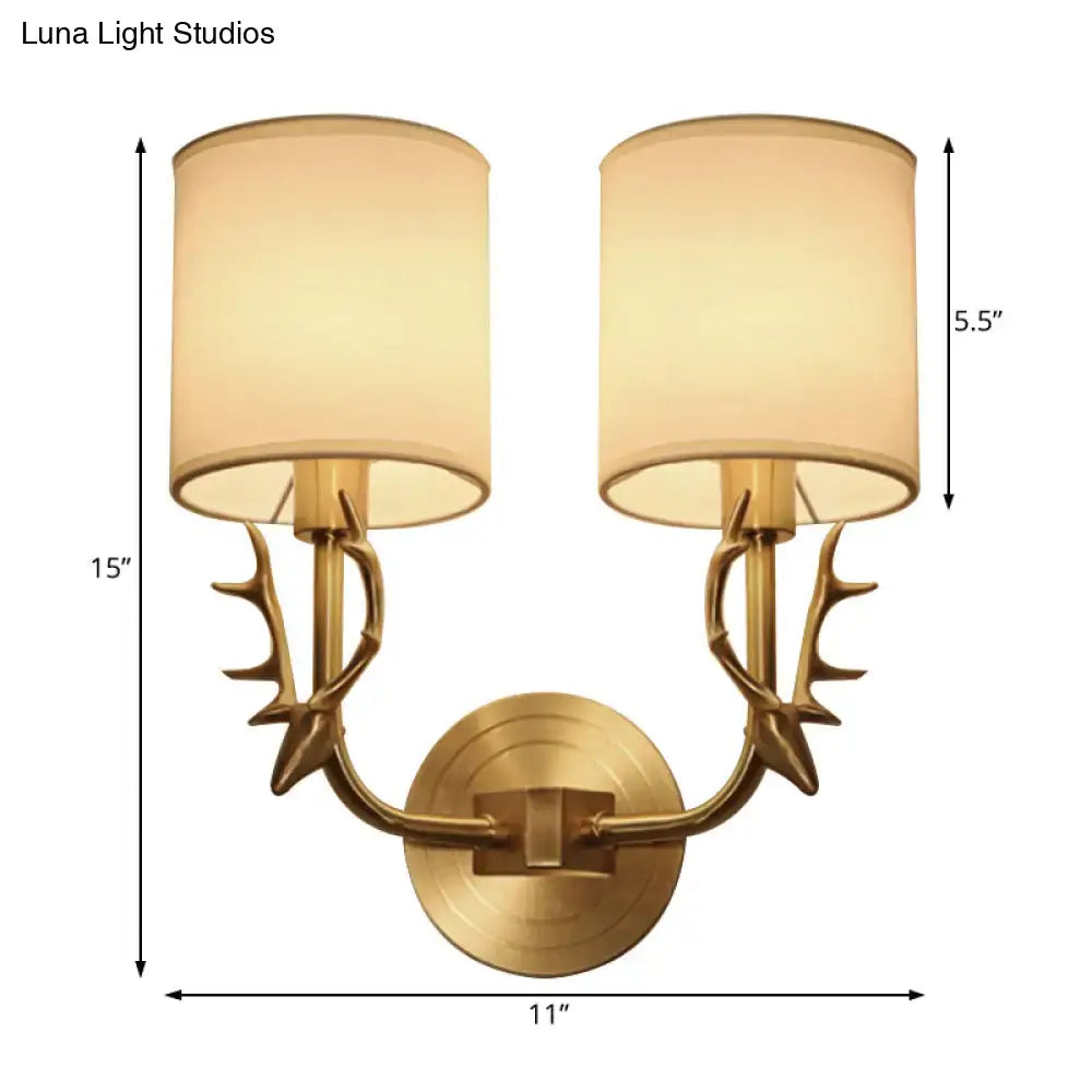 Antique brass antler wall sconce with fabric shade – bedroom light