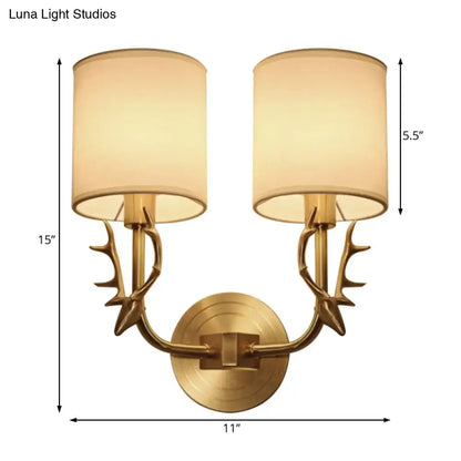 Antique brass antler wall sconce with fabric shade – bedroom light