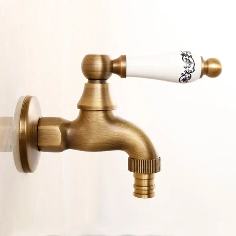 Antique brass bibcock faucet with floral ceramic handle garden tap