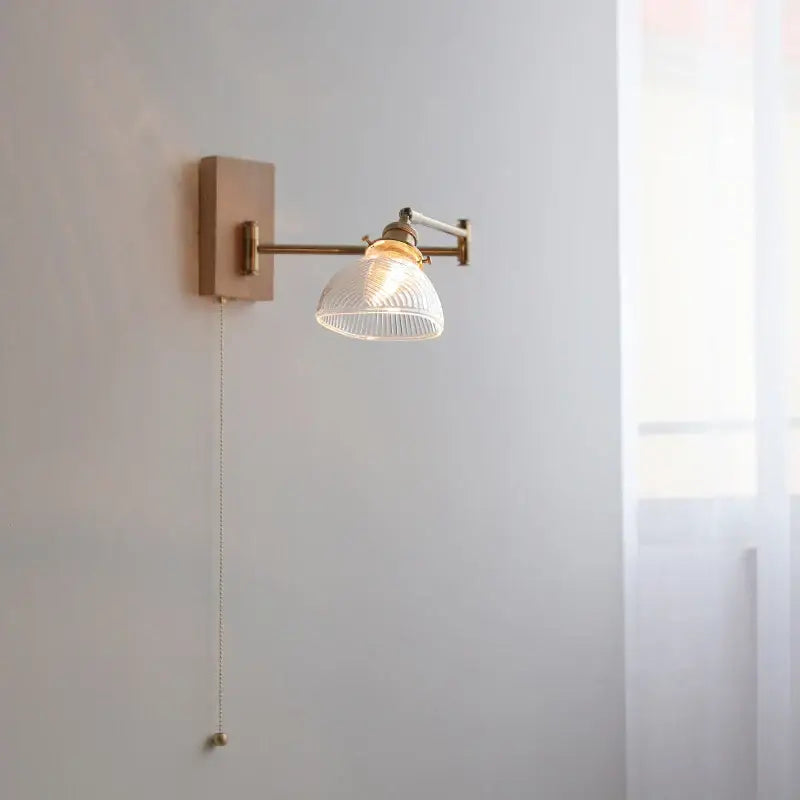 Antique brass industrial wall light with clear glass for bedroom