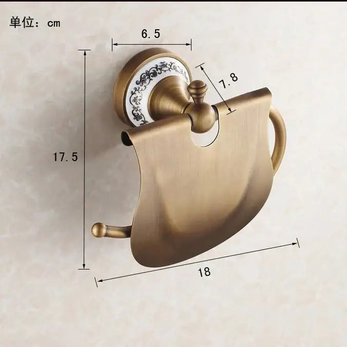 Antique brass wall mounted paper holder with ceramic base bathroom