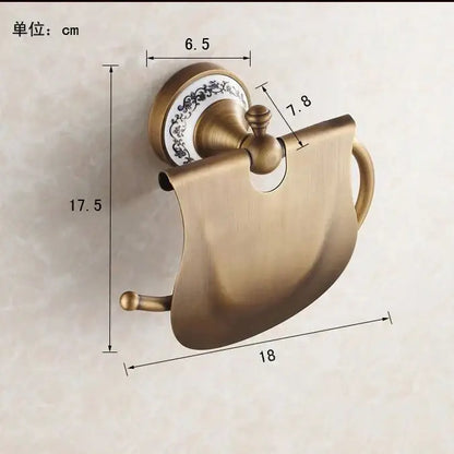 Antique brass wall mounted paper holder with ceramic base bathroom