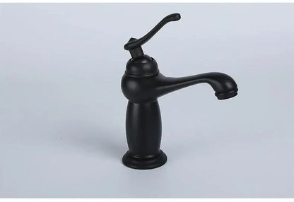 Antique bronze bathroom faucet with white ceramic ornate handle