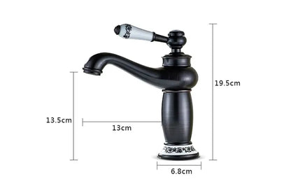 Antique bronze bathroom faucet with white ceramic ornate handle