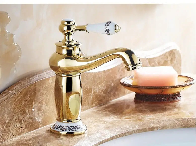 Antique bronze bathroom faucet with white ceramic ornate handle