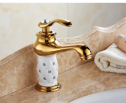 Antique bronze bathroom faucet with white ceramic ornate handle