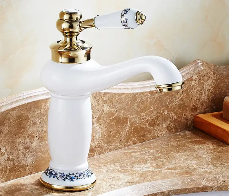 Antique bronze bathroom faucet with white ceramic ornate handle