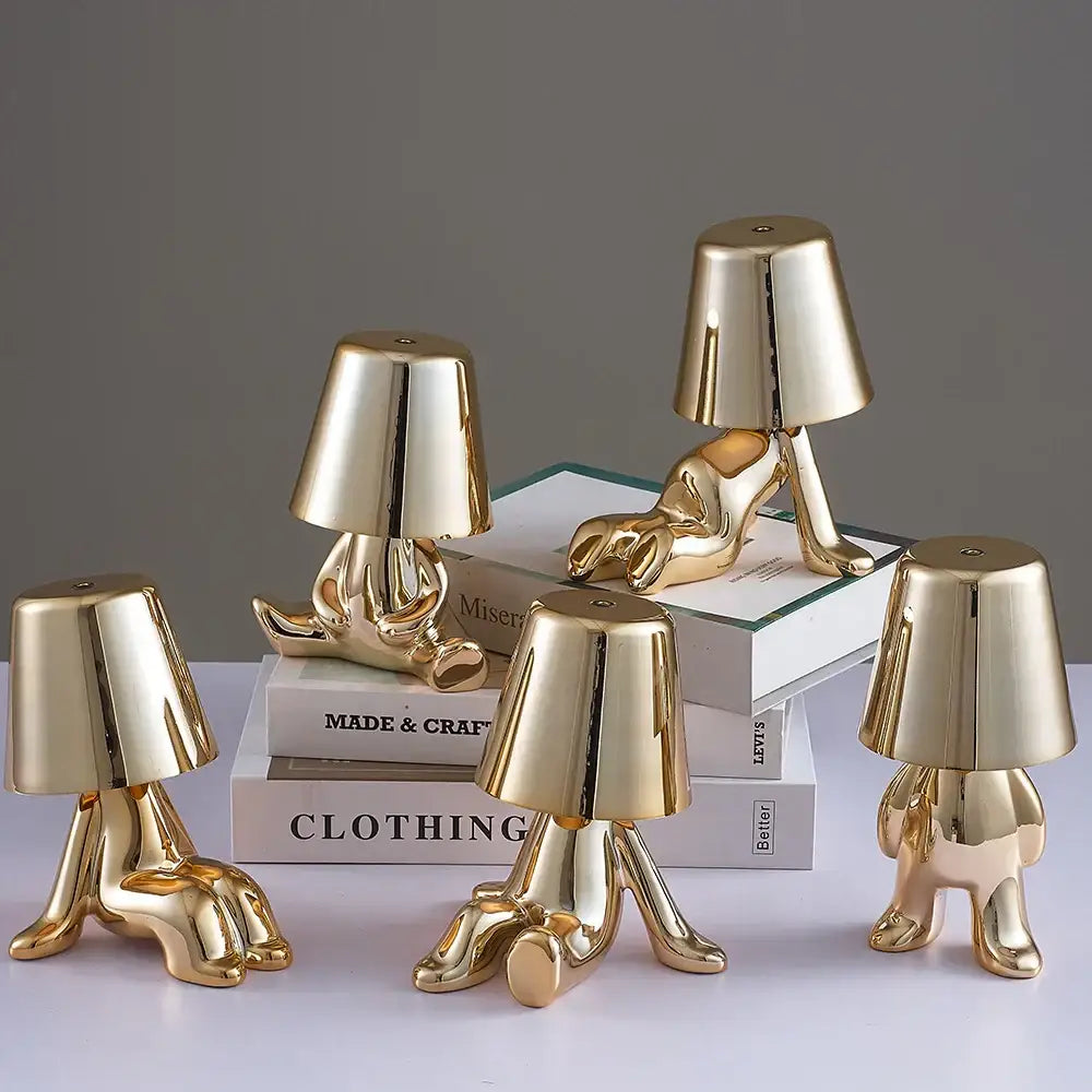 Articulated golden man table lamp for bedroom night light