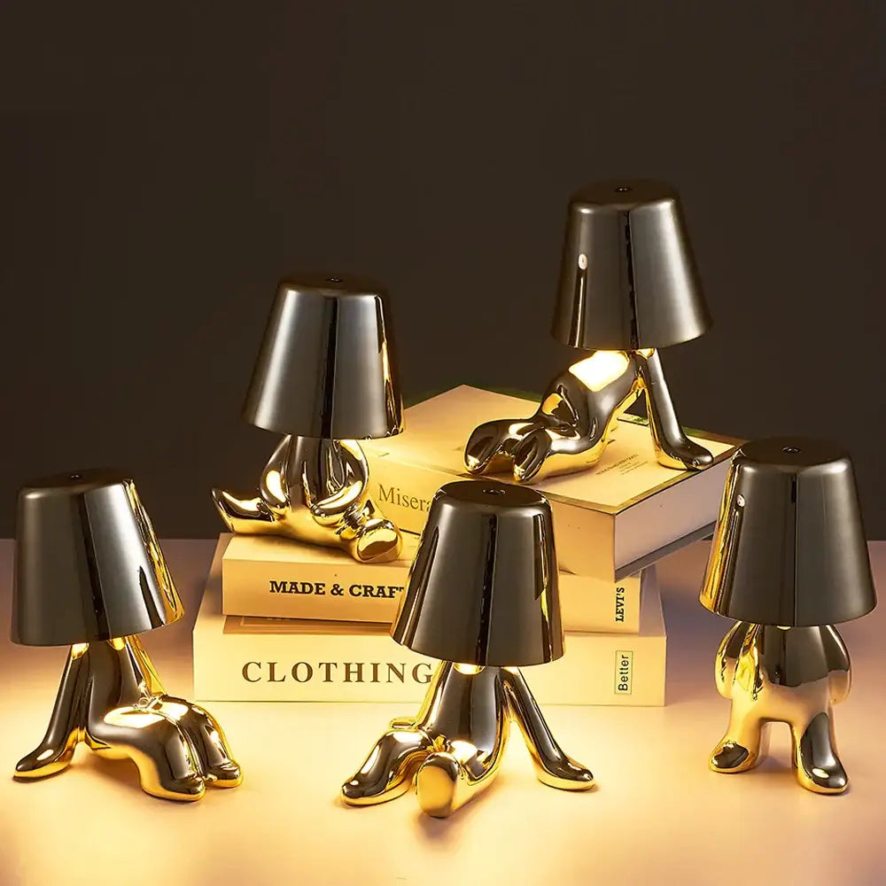 Articulated golden man table lamp for bedroom night light