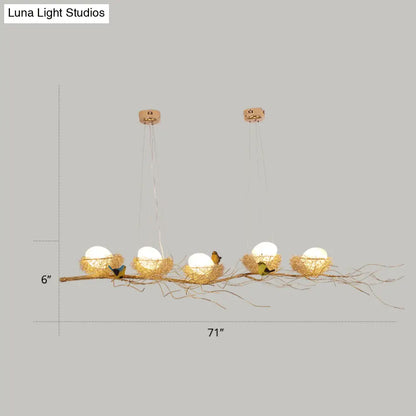 DecorBites™ Artistic Aluminum Wire Nest Island Lamp with Wood Egg and Bird: A Unique Suspension for Dining Room