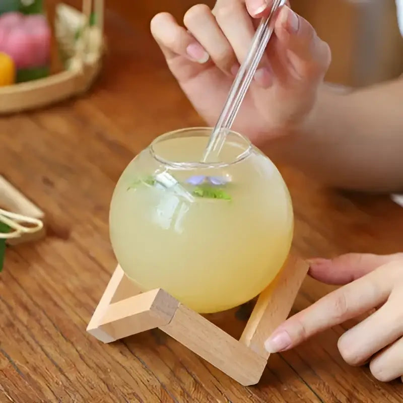 Ball shape coffee juice cocktail glass with straw dining room decor