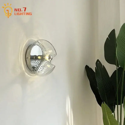 Bauhaus wavy glass wall lamp for bedroom clear and metallic light