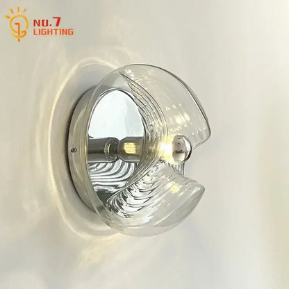 Bauhaus wavy glass wall lamp for bedroom clear and metallic light