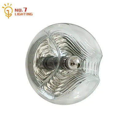 Bauhaus wavy glass wall lamp for bedroom clear and metallic light