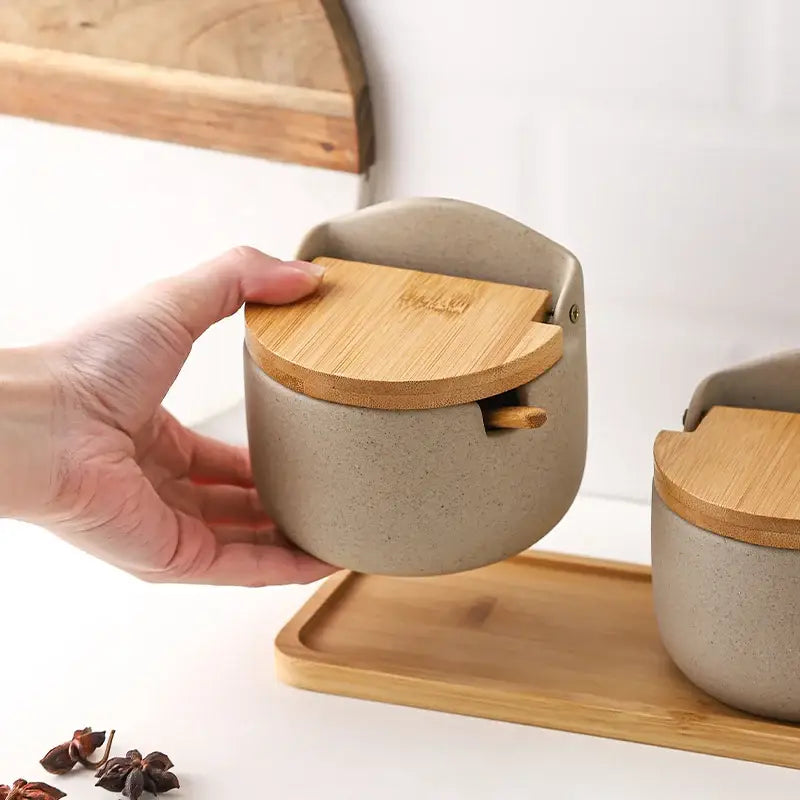 Beige ceramic seasoning jar set with bamboo lid kitchen shaker