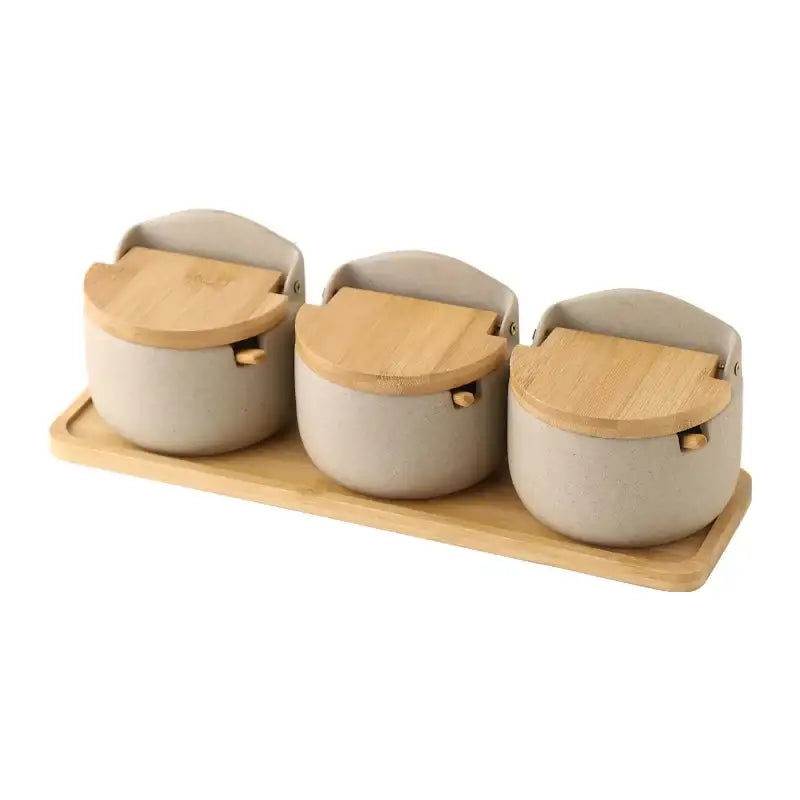 Beige ceramic seasoning jar set with bamboo lid kitchen shaker