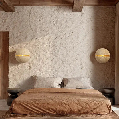 Beige dino egg stone wall lamp with gold accent for bedroom