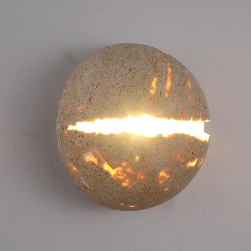 Beige dino egg stone wall lamp with gold accent for bedroom