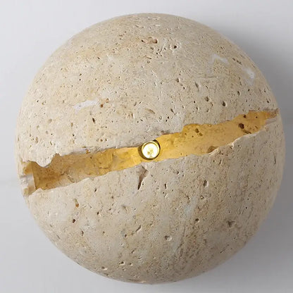Beige dino egg stone wall lamp with gold accent for bedroom