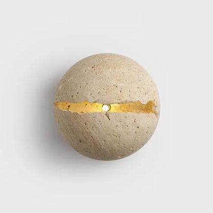 Beige dino egg stone wall lamp with gold accent for bedroom