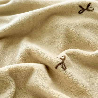Beige scalloped cozy coral fleece blanket bedroom bow decor
