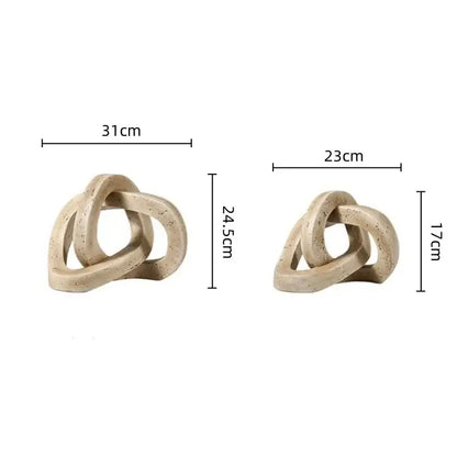Beige speckled geometric interlocking loop knot living room sculpture