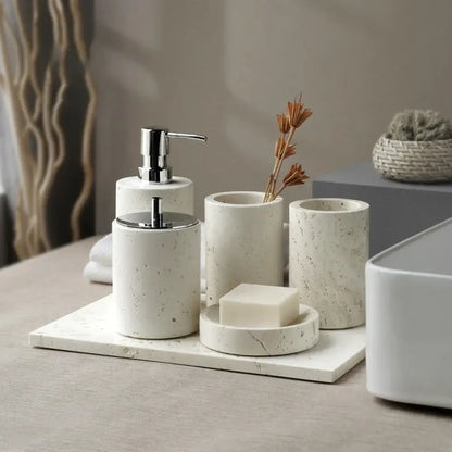 Beige travertine marble bathroom set with chrome pump dispensers