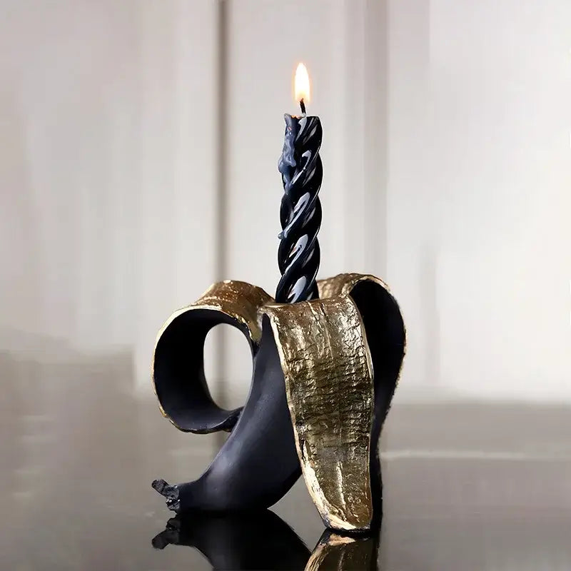 Black and gold banana candlestick holder for dining room decor