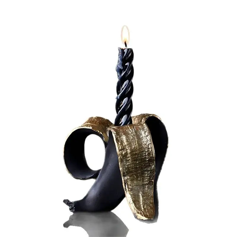 Black and gold banana candlestick holder for dining room decor
