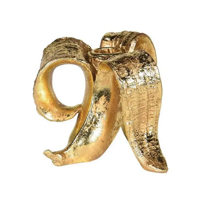 Black and gold banana candlestick holder for dining room decor