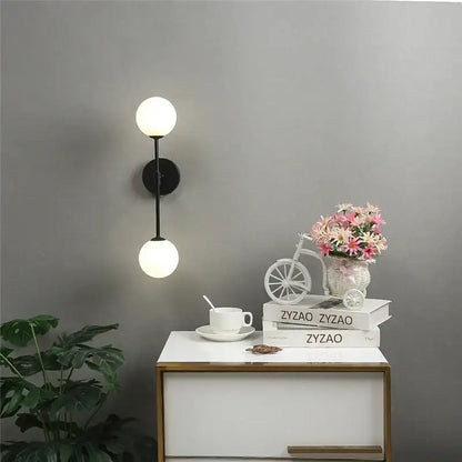 Black and gold glass wall lamp bedroom dual globe sconce
