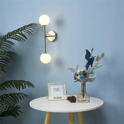 Black and gold glass wall lamp bedroom dual globe sconce