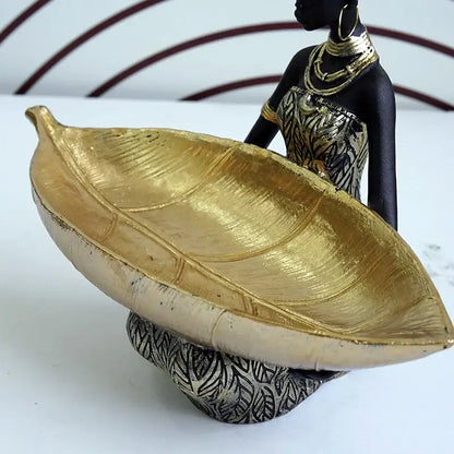 Black and gold resin black woman figurine with living room tray